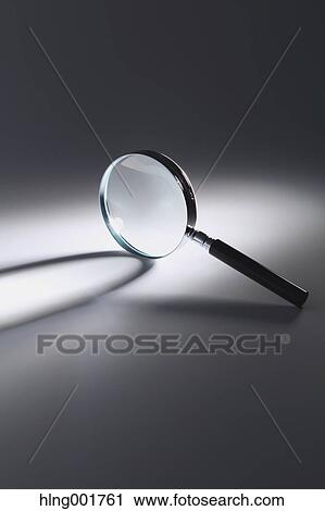 Stock Image - Magnifying glass. Fotosearch