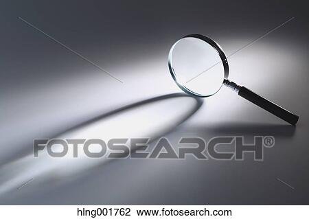 Stock Image - Magnifying glass. Fotosearch