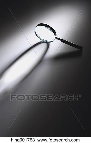Stock Image - Magnifying glass. Fotosearch