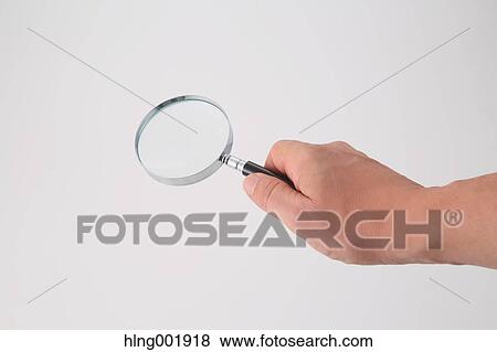 Stock Photo - Magnifying glass. Fotosearch