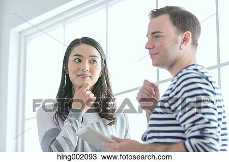 Multi-ethnic business people working in modern office View Large Photo Image Stock Image - Multi-ethnic business people working in modern office. Fotosearch