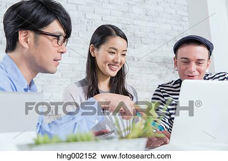 Multi-ethnic business people working in modern office View Large Photo Image Stock Image - Multi-ethnic business people working in modern office. Fotosearch