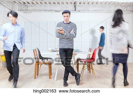 Multi-ethnic business people working in modern office View Large Photo Image Stock Image - Multi-ethnic business people working in modern office. Fotosearch