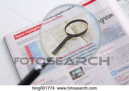Newspaper and magnifying glass View Large Photo Image Picture - Newspaper and magnifying glass. Fotosearch