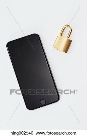 Stock Image - Safety lock and smartphone. Fotosearch