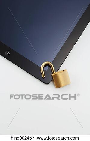 Safety lock and tablet View Large Photo Image Stock Photo - Safety lock and tablet. Fotosearch