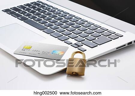 Safety lock credit card and laptop View Large Photo Image Stock Image - Safety lock credit card and laptop. Fotosearch