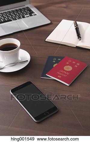 Stock Photo - Smartphone coffee and passports. Fotosearch
