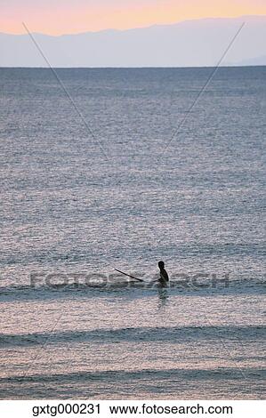 Surfer in Enoshima, Kanagawa Prefecture, Japan View Large Photo Image Stock Image - Surfer in Enoshima, Kanagawa Prefecture, Japan. Fotosearch