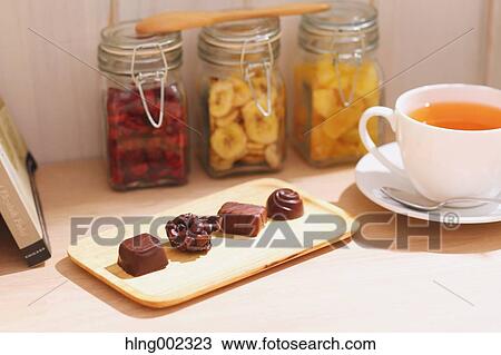 Tea and chocolate View Large Photo Image Stock Image - Tea and chocolate. Fotosearch