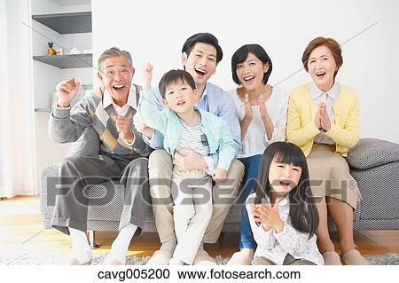 Three-generation Japanese family on the sofa in the living room View Large Photo Image Stock Image - Three-generation Japanese family on the sofa in the living room. Fotosearch