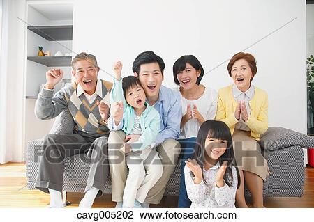 Three-generation Japanese family on the sofa in the living room View Large Photo Image Stock Image - Three-generation Japanese family on the sofa in the living room. Fotosearch