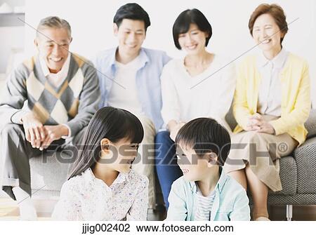 Three-generation Japanese family on the sofa in the living room View Large Photo Image Stock Image - Three-generation Japanese family on the sofa in the living room. Fotosearch