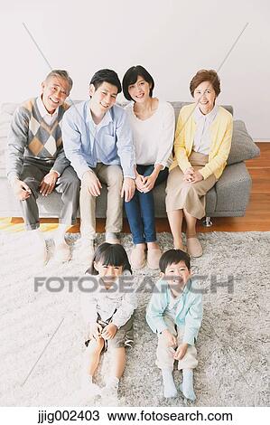 Three-generation Japanese family on the sofa in the living room View Large Photo Image Stock Image - Three-generation Japanese family on the sofa in the living room. Fotosearch