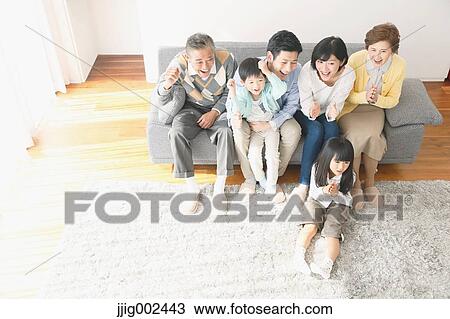 Three-generation Japanese family on the sofa in the living room View Large Photo Image Stock Image - Three-generation Japanese family on the sofa in the living room. Fotosearch