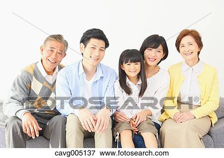 Three-generation Japanese family on the sofa in the living room View Large Photo Image Stock Photo - Three-generation Japanese family on the sofa in the living room. Fotosearch