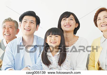 Three-generation Japanese family on the sofa in the living room View Large Photo Image Stock Photo - Three-generation Japanese family on the sofa in the living room. Fotosearch