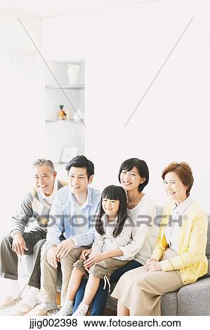 Three-generation Japanese family on the sofa in the living room View Large Photo Image Stock Photo - Three-generation Japanese family on the sofa in the living room. Fotosearch
