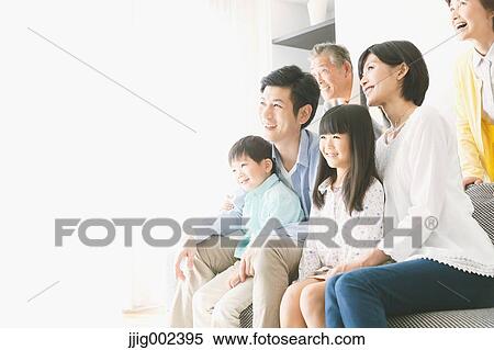Three-generation Japanese family on the sofa in the living room View Large Photo Image Stock Photography - Three-generation Japanese family on the sofa in the living room. Fotosearch