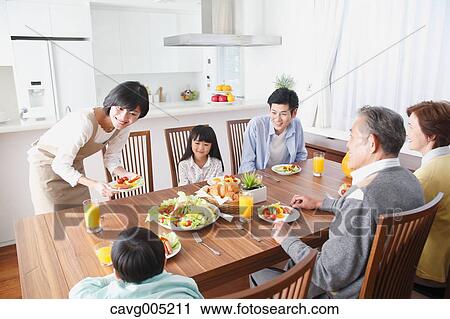 Three-generation Japanese family together in the kitchen View Large Photo Image Stock Image - Three-generation Japanese family together in the kitchen. Fotosearch