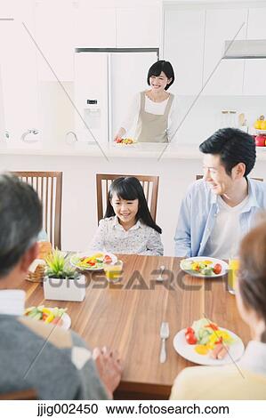 Three-generation Japanese family together in the kitchen View Large Photo Image Stock Image - Three-generation Japanese family together in the kitchen. Fotosearch