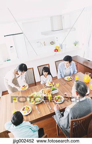 Three-generation Japanese family together in the kitchen View Large Photo Image Stock Image - Three-generation Japanese family together in the kitchen. Fotosearch