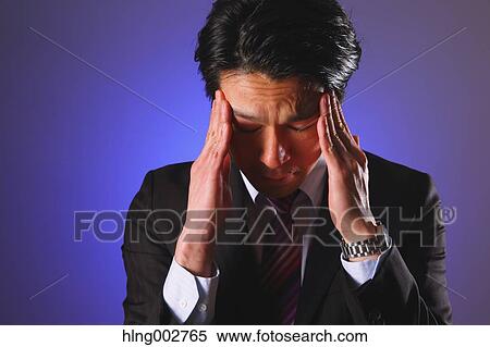 Tired Japanese businessman View Large Photo Image Stock Photography - Tired Japanese businessman. Fotosearch