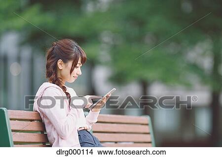 University student in the campus park View Large Photo Image Picture - University student in the campus park. Fotosearch