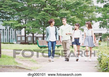 Stock Image - University student in the campus park. Fotosearch