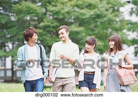 Stock Image - University student in the campus park. Fotosearch