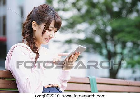 University student in the campus park View Large Photo Image Stock Image - University student in the campus park. Fotosearch