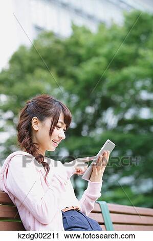 University student in the campus park View Large Photo Image Stock Image - University student in the campus park. Fotosearch