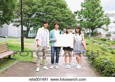 University student in the campus park View Large Photo Image Stock Image - University student in the campus park. Fotosearch