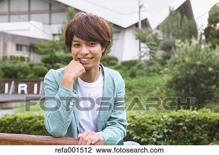 University student in the campus park View Large Photo Image Stock Image - University student in the campus park. Fotosearch