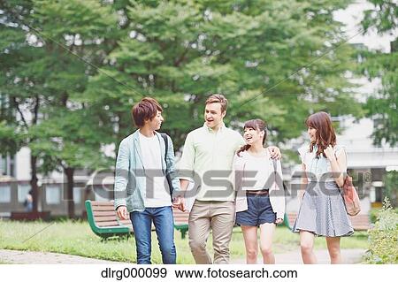 Stock Photo - University student in the campus park. Fotosearch