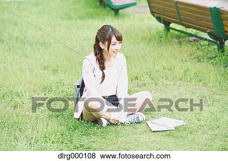 Stock Photo - University student in the campus park. Fotosearch