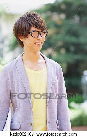 University student in the campus park View Large Photo Image Stock Photo - University student in the campus park. Fotosearch