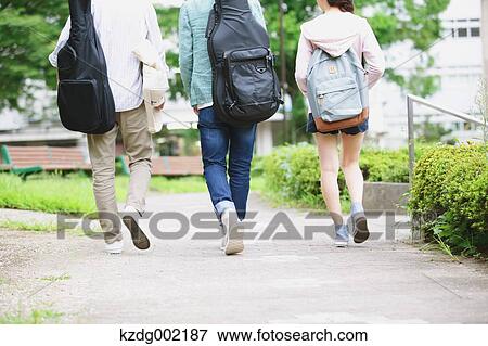 University student in the campus park View Large Photo Image Stock Photo - University student in the campus park. Fotosearch