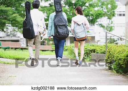 University student in the campus park View Large Photo Image Stock Photo - University student in the campus park. Fotosearch