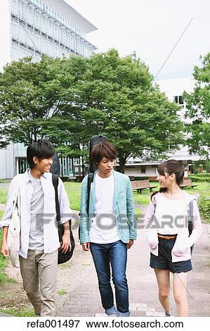 Stock Photo - University student in the campus park. Fotosearch