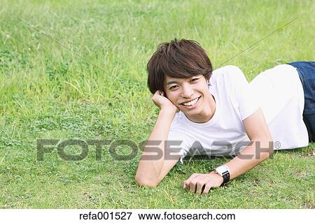 University student in the campus park View Large Photo Image Stock Photo - University student in the campus park. Fotosearch