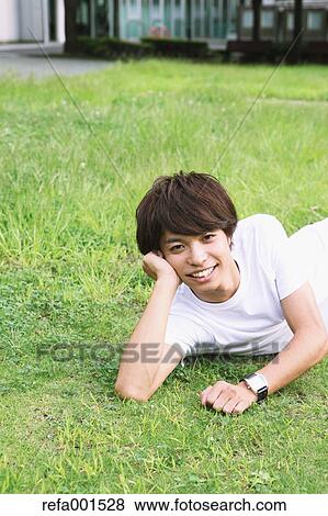 University student in the campus park View Large Photo Image Stock Photo - University student in the campus park. Fotosearch