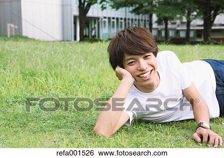 University student in the campus park View Large Photo Image Stock Photograph - University student in the campus park. Fotosearch