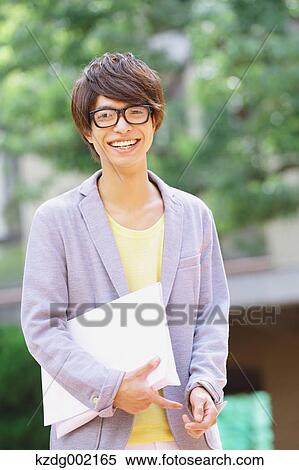 University student in the campus park View Large Photo Image Stock Photography - University student in the campus park. Fotosearch