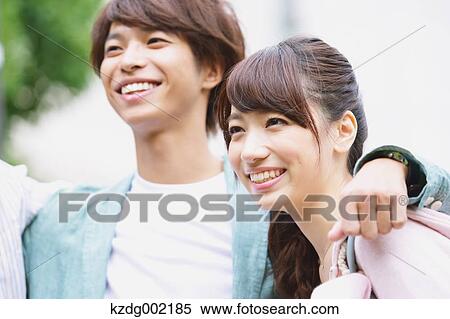 Stock Photography - University student in the campus park. Fotosearch