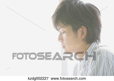 Stock Photo - University student in the classroom. Fotosearch