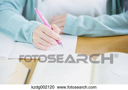 University student in the library View Large Photo Image Stock Image - University student in the library. Fotosearch
