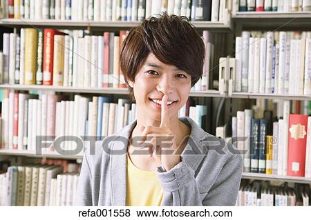 University student in the library View Large Photo Image Stock Photo - University student in the library. Fotosearch