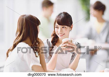 Stock Image - University student in the school cafe. Fotosearch