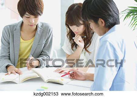 Stock Image - University student in the school cafe. Fotosearch